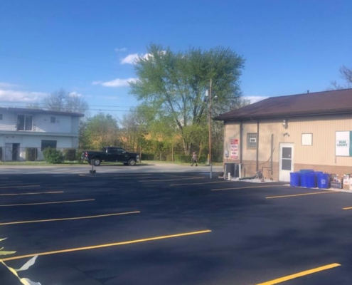 Sealcoating and line striping Mama Rucas parking lot in Hopwood